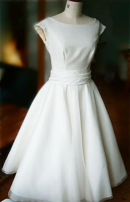 50s dress channeling Audrey Hepburn polka dot wedding dress